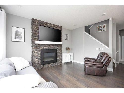 115 Airmont Court, Fort Mcmurray, AB - Indoor Photo Showing Living Room With Fireplace