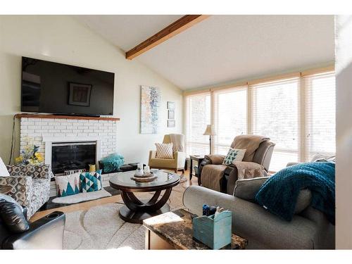 136 Marten Place, Fort Mcmurray, AB - Indoor Photo Showing Living Room With Fireplace
