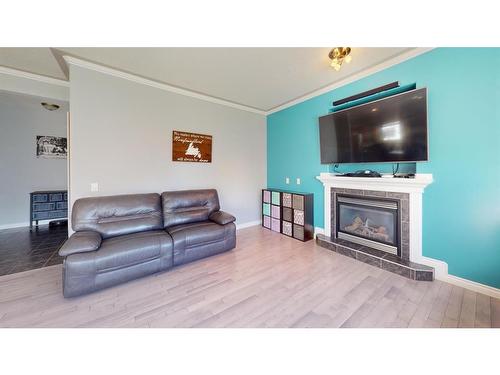 290 Pacific Crescent, Fort Mcmurray, AB - Indoor Photo Showing Living Room With Fireplace