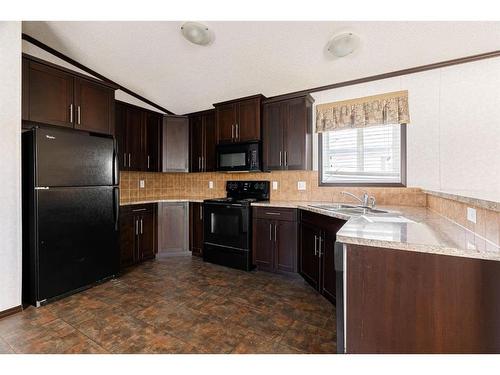 305 Gregoire Crescent, Fort Mcmurray, AB - Indoor Photo Showing Kitchen