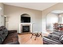187 Breukel Crescent, Fort Mcmurray, AB  - Indoor Photo Showing Living Room With Fireplace 