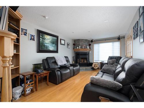 147 Brett Drive, Fort Mcmurray, AB - Indoor Photo Showing Living Room With Fireplace