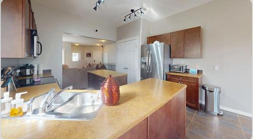 390 Pacific Crescent, Fort Mcmurray, AB - Indoor Photo Showing Kitchen With Double Sink