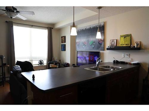 2110-204 Sparrow Hawk Drive, Fort Mcmurray, AB - Indoor Photo Showing Kitchen With Double Sink
