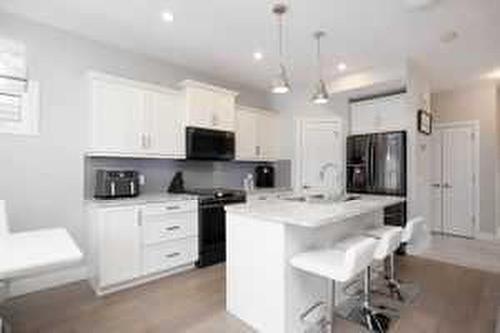 253 Siltstone Place, Fort Mcmurray, AB - Indoor Photo Showing Kitchen With Upgraded Kitchen