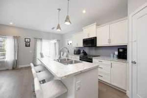 253 Siltstone Place, Fort Mcmurray, AB - Indoor Photo Showing Kitchen