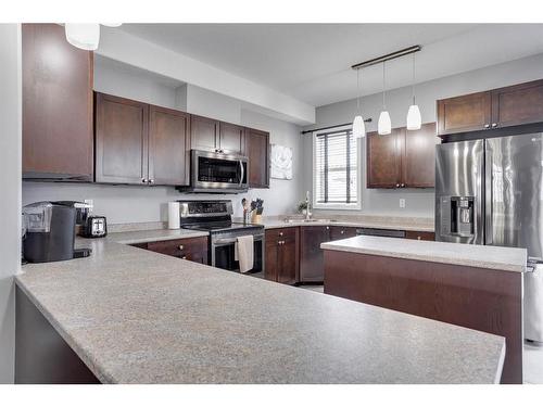 269 Grosbeak Way, Fort Mcmurray, AB - Indoor Photo Showing Kitchen With Stainless Steel Kitchen With Upgraded Kitchen