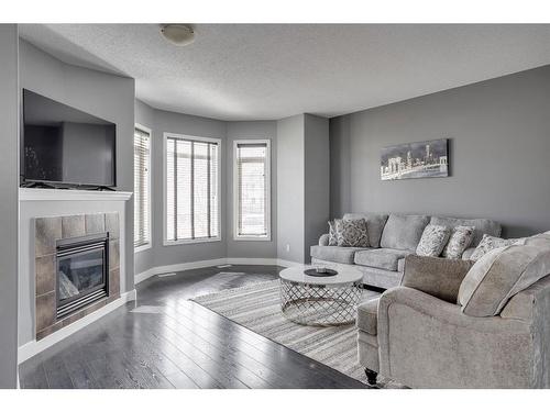 269 Grosbeak Way, Fort Mcmurray, AB - Indoor Photo Showing Living Room With Fireplace