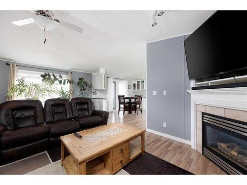 157 Mckinlay Crescent, Fort Mcmurray, AB - Indoor Photo Showing Living Room With Fireplace