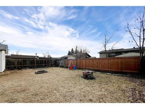 174 Oaks Crescent, Fort Mcmurray, AB - Outdoor With Backyard