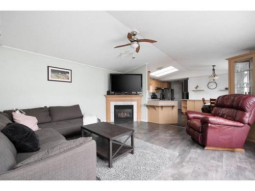 205 Cree Road, Fort Mcmurray, AB - Indoor Photo Showing Living Room With Fireplace