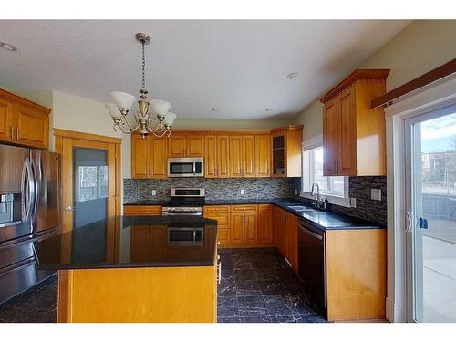 418 Grosbeak Way, Fort Mcmurray, AB - Indoor Photo Showing Kitchen With Stainless Steel Kitchen With Double Sink