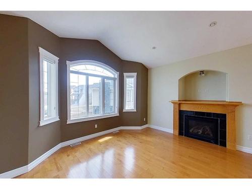 418 Grosbeak Way, Fort Mcmurray, AB - Indoor Photo Showing Living Room With Fireplace