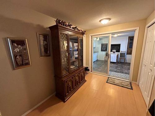 142-13352 Lakeland Drive, Lac La Biche, AB - Indoor Photo Showing Living Room With Fireplace