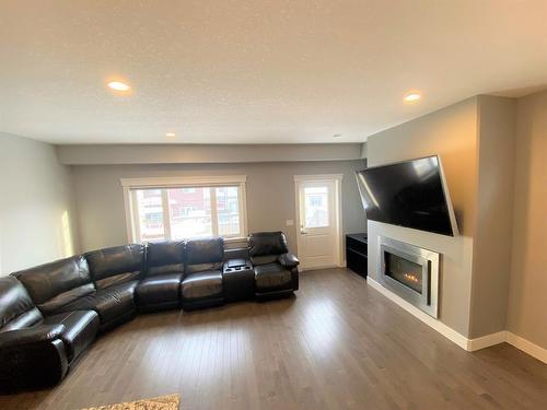 173 Collicott Drive, Fort Mcmurray, AB - Indoor Photo Showing Living Room With Fireplace