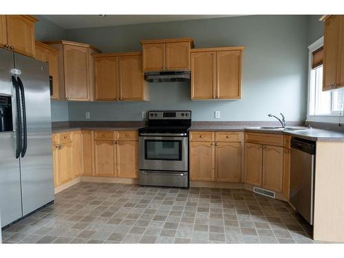 158 Archibald Bay, Fort Mcmurray, AB - Indoor Photo Showing Kitchen With Double Sink