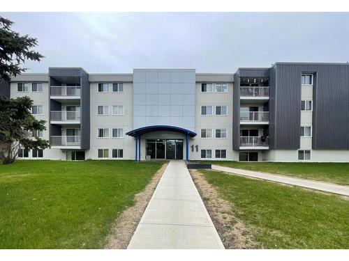 108-11 Clearwater Crescent, Fort Mcmurray, AB - Outdoor With Balcony With Facade