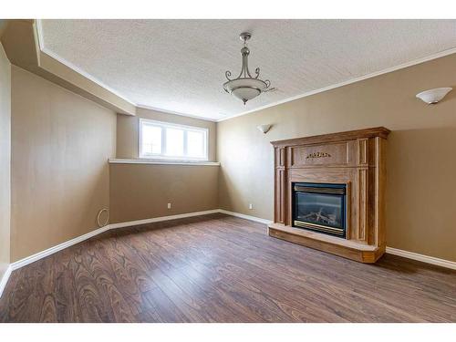 223 Williams Drive, Fort Mcmurray, AB - Indoor Photo Showing Living Room With Fireplace