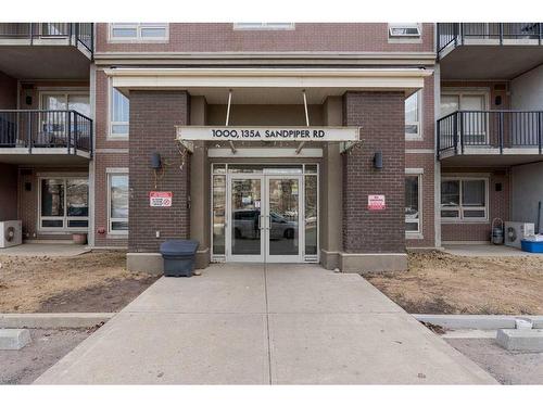 1315-135A Sandpiper Road, Fort Mcmurray, AB - Outdoor With Balcony With Facade