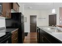 1315-135A Sandpiper Road, Fort Mcmurray, AB  - Indoor Photo Showing Kitchen With Double Sink 