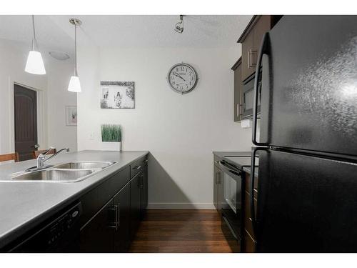 1315-135A Sandpiper Road, Fort Mcmurray, AB - Indoor Photo Showing Kitchen With Double Sink