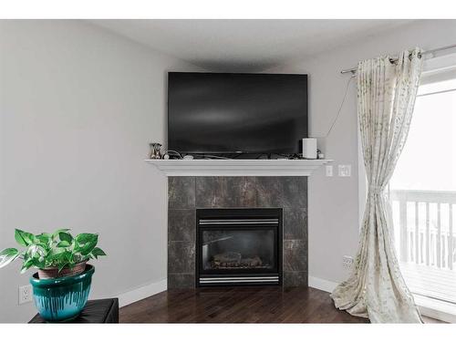 410 Grosbeak Way, Fort Mcmurray, AB - Indoor Photo Showing Living Room With Fireplace