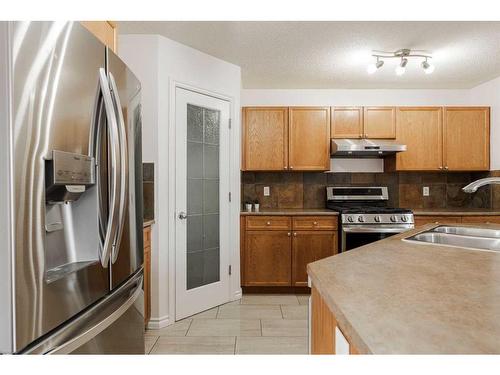 179 Loutit Road, Fort Mcmurray, AB - Indoor Photo Showing Kitchen With Double Sink