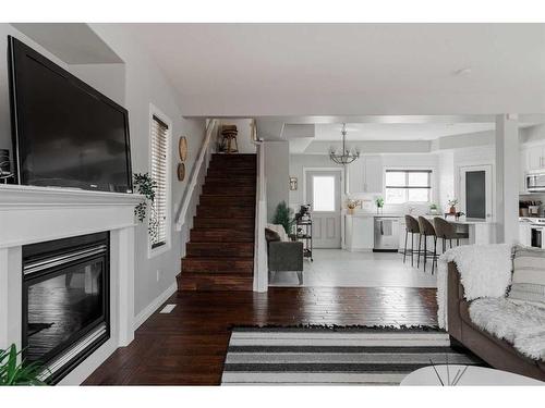 185 Snowy Owl Way, Fort Mcmurray, AB - Indoor Photo Showing Living Room With Fireplace