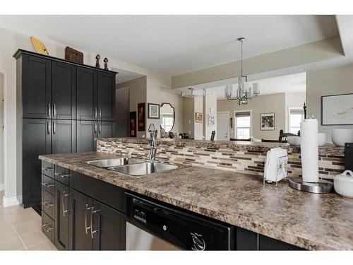 1-300 Sparrow Hawk Drive, Fort Mcmurray, AB - Indoor Photo Showing Kitchen With Double Sink