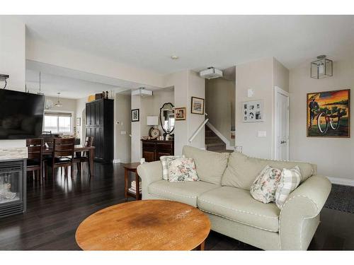 1-300 Sparrow Hawk Drive, Fort Mcmurray, AB - Indoor Photo Showing Living Room With Fireplace