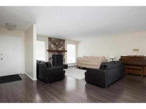 173 Ross Haven Drive, Fort Mcmurray, AB - Indoor Photo Showing Living Room With Fireplace