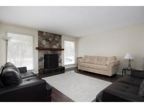 173 Ross Haven Drive, Fort Mcmurray, AB - Indoor Photo Showing Living Room With Fireplace