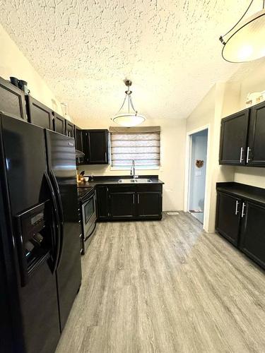 191 Cochrane Crescent Nw, Fort Mcmurray, AB - Indoor Photo Showing Kitchen With Double Sink