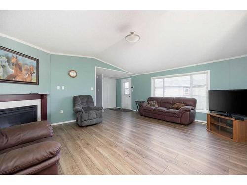 121 Fir Street, Fort Mcmurray, AB - Indoor Photo Showing Living Room With Fireplace