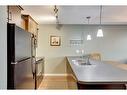 1301-135A Sandpiper Road, Fort Mcmurray, AB  - Indoor Photo Showing Kitchen With Double Sink 