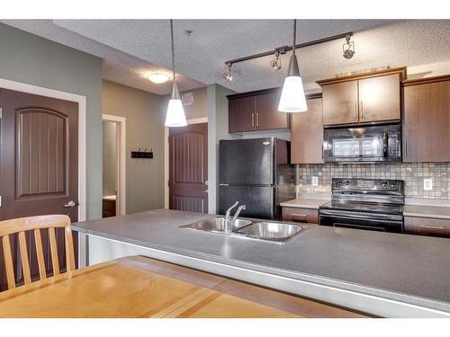 1301-135A Sandpiper Road, Fort Mcmurray, AB - Indoor Photo Showing Kitchen With Double Sink