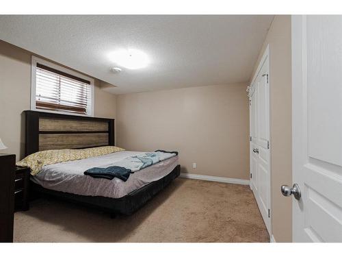 108 Dakin Drive, Fort Mcmurray, AB - Indoor Photo Showing Bedroom