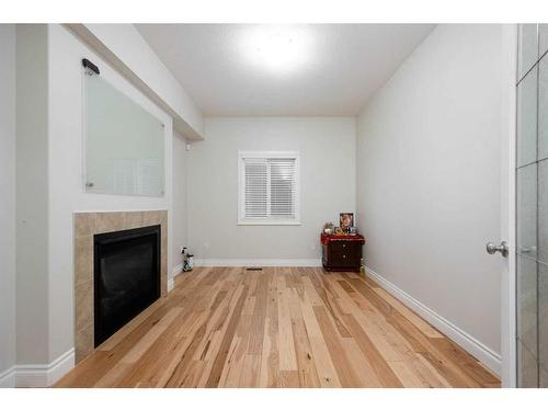 233 Blackburn Drive, Fort Mcmurray, AB - Indoor Photo Showing Other Room With Fireplace
