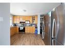 3 Armit, Fort Mcmurray, AB  - Indoor Photo Showing Kitchen 