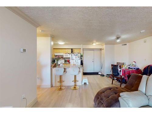 2211-38 Riedel Street, Fort Mcmurray, AB - Indoor Photo Showing Living Room