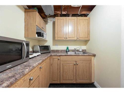 109 Hillcrest Drive, Fort Mcmurray, AB - Indoor Photo Showing Kitchen With Double Sink