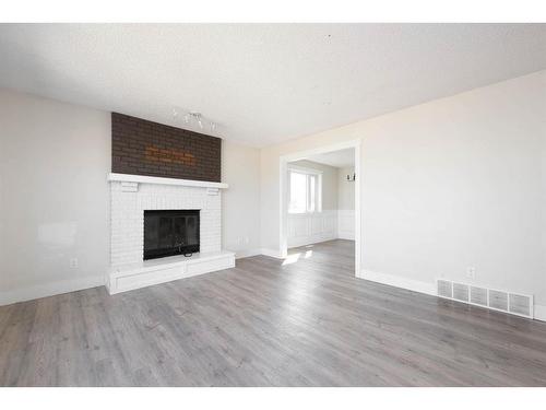 158 Brintnell Road, Fort Mcmurray, AB - Indoor Photo Showing Living Room With Fireplace