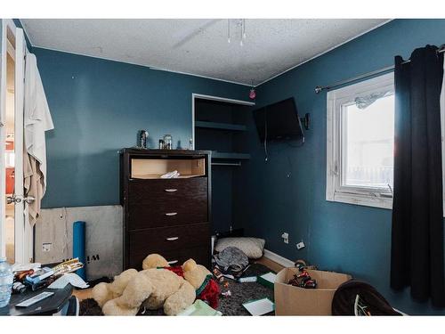 128 Clausen Crescent, Fort Mcmurray, AB - Indoor Photo Showing Bedroom