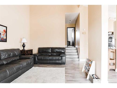 214 Wolverine Drive, Fort Mcmurray, AB - Indoor Photo Showing Living Room With Fireplace