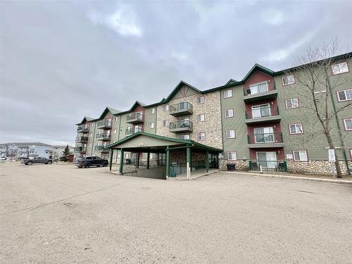 3405-200 Lougheed Drive, Fort Mcmurray, AB - Outdoor With Balcony With Facade