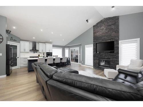 180 Merganser Crescent, Fort Mcmurray, AB - Indoor Photo Showing Living Room With Fireplace