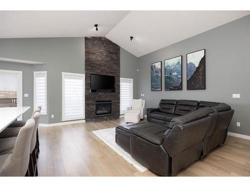 180 Merganser Crescent, Fort Mcmurray, AB - Indoor Photo Showing Living Room With Fireplace