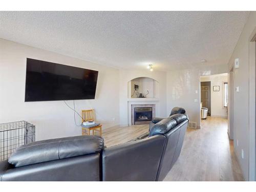 257 Rainbow Creek Drive, Fort Mcmurray, AB - Indoor Photo Showing Living Room With Fireplace