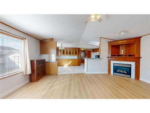 116 Mckinlay Crescent, Fort Mcmurray, AB - Indoor Photo Showing Living Room With Fireplace