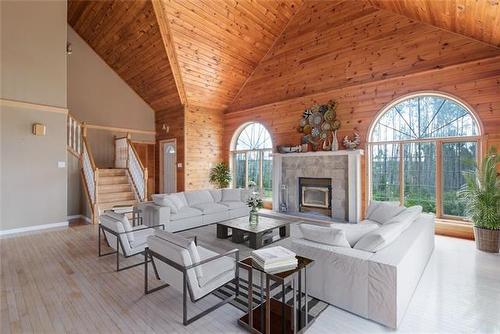 176 Saprae Crescent, Saprae Creek, AB - Indoor Photo Showing Living Room With Fireplace